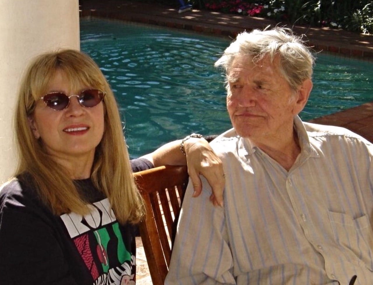 Suzanne Brenner with artist Robert Hodgins.